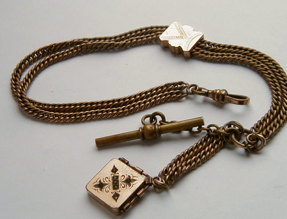 antique pocket watch and chain